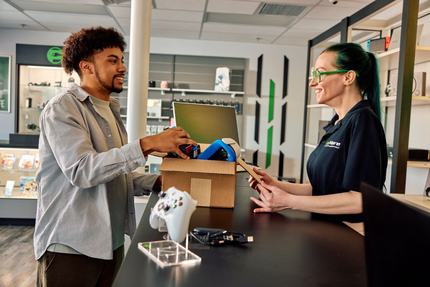 paymore employee inspecting electronics